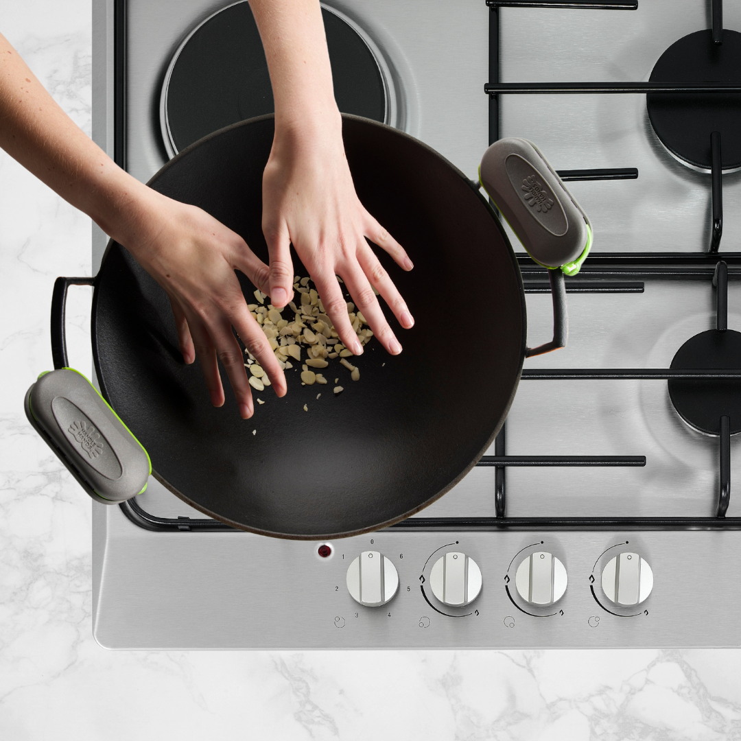 Keep hands free in the kitchen because PebbleGrip locks on and stays on the handles